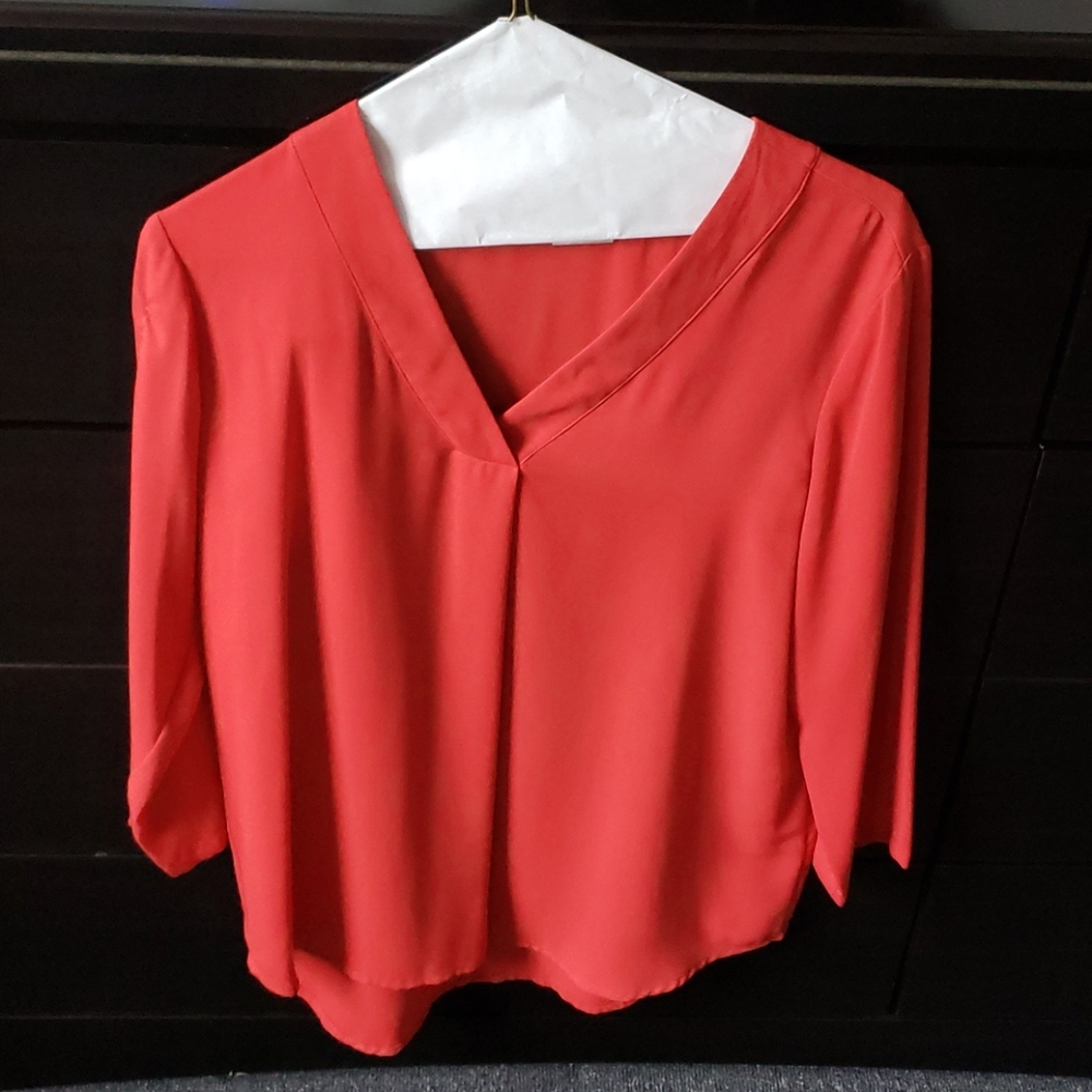 Top, can be paired with skinny jeans or slacks.